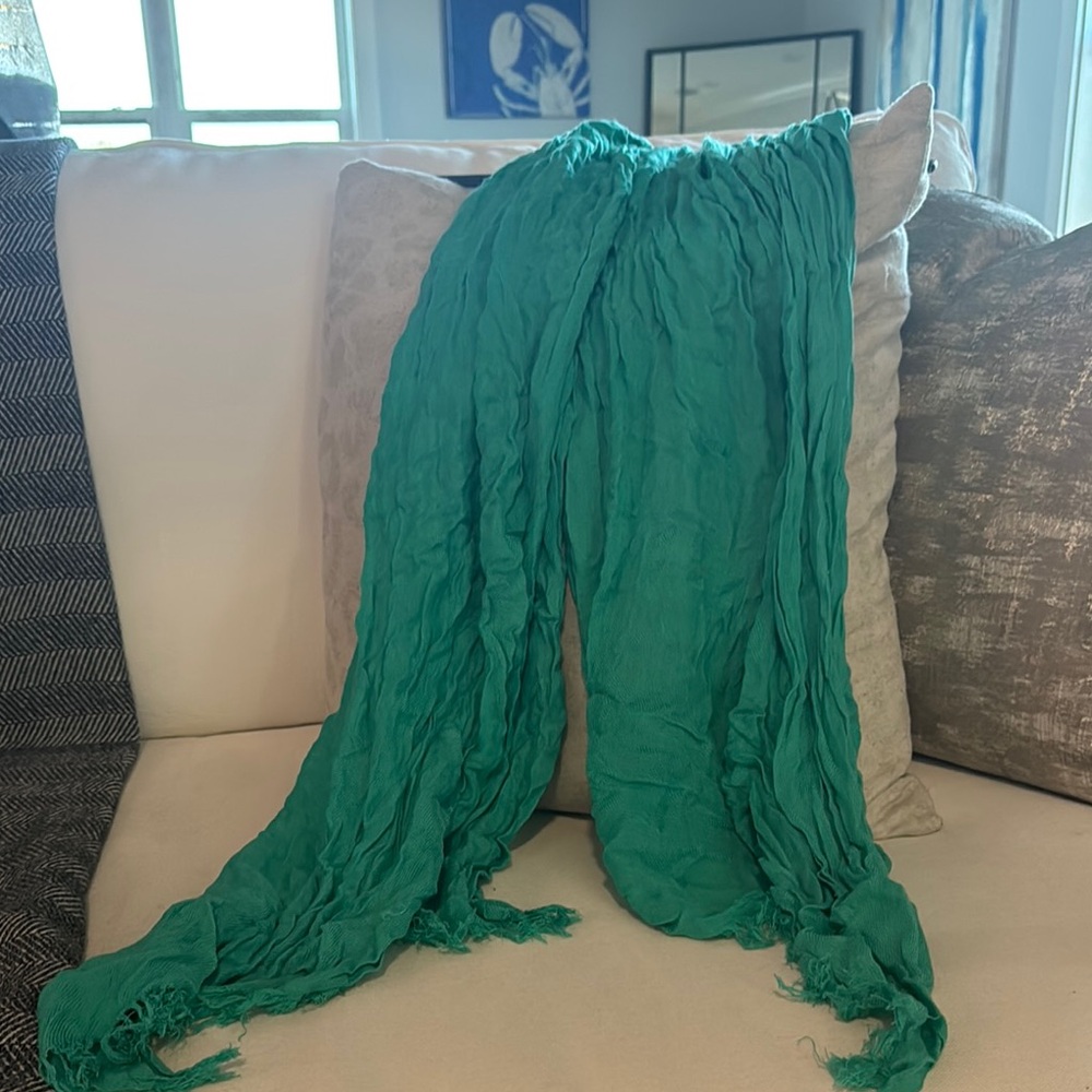 Teal scarf.